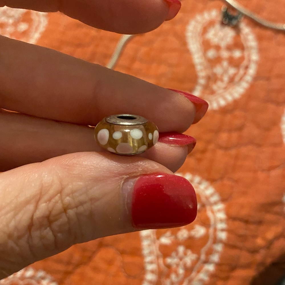Genuine Pandora murano glass bead.